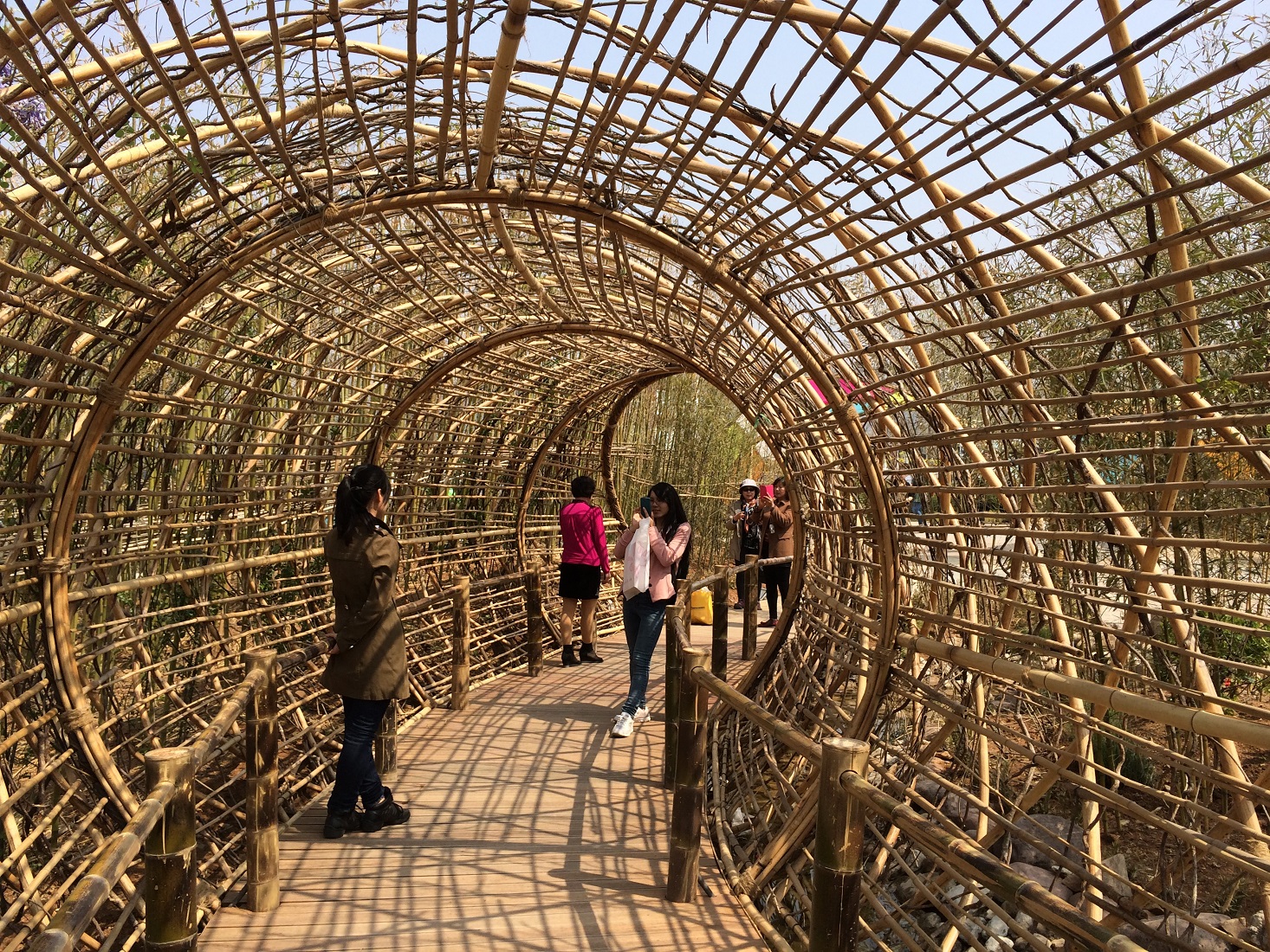 Qingdao Expo Opening INBAR rattan bridge with people - small